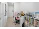 Cozy home office featuring a desk, chair, and built-in shelving for an organized and productive workspace at 13589 Mcmillan Dr, Orlando, FL 32827