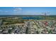 Aerial view featuring a Primary-planned community with lakes, and distant views of Disney's Magic Kingdom at 14602 Winter Stay Dr, Winter Garden, FL 34787