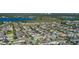 Aerial view of a residential community with lakes, lush greenery, and well-maintained homes at 14602 Winter Stay Dr, Winter Garden, FL 34787