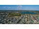 Aerial view of a beautiful Primary-planned community, featuring lush landscaping and serene community lakes at 14602 Winter Stay Dr, Winter Garden, FL 34787
