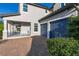 Close up exterior shot of a two car garage and covered porch with white railings at 14602 Winter Stay Dr, Winter Garden, FL 34787