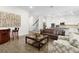 Open concept floorplan joining the living room, kitchen and staircase creating a modern space at 14602 Winter Stay Dr, Winter Garden, FL 34787