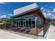 A view of the exterior of a Starbucks, including an outdoor seating area at 14602 Winter Stay Dr, Winter Garden, FL 34787