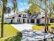 Beautiful new construction featuring a spacious three-car garage and modern architectural design at 1475 Warrior Trl, Enterprise, FL 32725