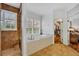 Bathroom featuring a soaking tub, walk in shower, and walk-in closet at 1741 Pine Ave, Winter Park, FL 32789