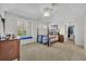 Relaxing bedroom with a comfortable bed, natural light, and ample space for a dresser at 1741 Pine Ave, Winter Park, FL 32789