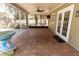 Screened-in patio with tile flooring at 1770 Nordic Ct, Apopka, FL 32712