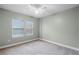 Neutral bedroom featuring plush carpeting, with natural light, and neutral walls at 1900 Garvin St, Orlando, FL 32803
