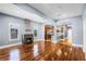 Spacious living room featuring hardwood floors and an open floor plan to the kitchen at 1900 Garvin St, Orlando, FL 32803