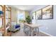 Bright office featuring a modern desk, comfortable seating, and natural light at 1940 Tamarack Pass, Davenport, FL 33837