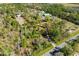 Expansive property showcasing mature trees and a winding drive at 20773 Starry St, Orlando, FL 32833