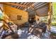 Rustic barn with wood beams, cozy seating, and a metal roof at 20773 Starry St, Orlando, FL 32833