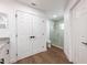 Well-lit bathroom showcasing a glass-enclosed shower with modern white and gray finishes at 20773 Starry St, Orlando, FL 32833