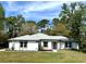 Charming single-story home with well-maintained lawn and beautiful landscaping at 20773 Starry St, Orlando, FL 32833