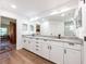 Bright bathroom with double vanity, granite countertop, and modern fixtures at 20773 Starry St, Orlando, FL 32833
