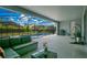 Relax on the spacious screened-in patio overlooking the pool and lush backyard at 2348 Victoria Dr, Davenport, FL 33837