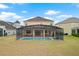 Aerial view of backyard pool and patio with a full screen enclosure on a large private lot at 2371 Victoria Dr, Davenport, FL 33837