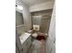 Bathroom featuring shower with sliding glass doors, vanity, and tile flooring at 250 Raintree Dr, Casselberry, FL 32707