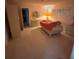 Bedroom features tile flooring, window, and closet at 250 Raintree Dr, Casselberry, FL 32707