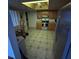 Spacious kitchen featuring updated stainless steel appliances and tile flooring at 250 Raintree Dr, Casselberry, FL 32707