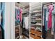 Well-organized closet with shelves, hanging rods, and storage baskets at 2724 Sarzana Ln, Apopka, FL 32712