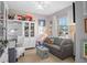 Cozy living room with comfortable seating, plenty of room for a sofa and shelving at 2724 Sarzana Ln, Apopka, FL 32712