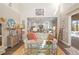 Inviting living room opens to a bright kitchen and screened lanai with pool at 2724 Sarzana Ln, Apopka, FL 32712