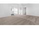 Bright bedroom features neutral carpet, ensuite bathroom, and ample natural light, creating a serene atmosphere at 2788 Pierr St, Davenport, FL 33837