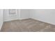 A bedroom with neutral carpet at 2788 Pierr St, Davenport, FL 33837