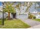 Charming two-story home with a brick paver driveway and well-maintained landscaping at 3010 Ballad Rd, Kissimmee, FL 34746