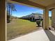 Backyard view of several houses with a patch of green grass at 3020 Alessa Loop, Apopka, FL 32703