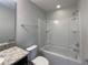 Full bathroom with tub and granite vanity at 3020 Alessa Loop, Apopka, FL 32703