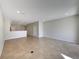 Open living room with tile floors, recessed lighting, and neutral paint at 3020 Alessa Loop, Apopka, FL 32703