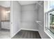 Walk-in closet with shelving and access to the bathroom at 30340 W Bluebell Ave, Eustis, FL 32736
