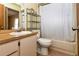 Bathroom featuring a wood-style countertop, a white sink, and a shower-tub combination at 358 Douglas Way # 78, Winter Garden, FL 34787
