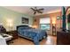 Comfortable bedroom featuring ample natural light and a ceiling fan at 358 Douglas Way # 78, Winter Garden, FL 34787