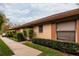 Inviting home exterior showcasing manicured shrubs and a clean walkway at 358 Douglas Way # 78, Winter Garden, FL 34787