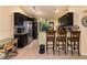 Modern kitchen boasting stainless steel appliances and bar-style seating at 358 Douglas Way # 78, Winter Garden, FL 34787