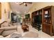 Open-concept living area with high ceilings, ceiling fan, and seamless kitchen access at 358 Douglas Way # 78, Winter Garden, FL 34787