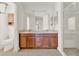 Bathroom with a double sink vanity and walk-in shower at 381 Corbett Dr, The Villages, FL 32162
