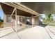 View of the home's covered carport and front entrance, providing shelter and convenience at 3905 Cherry Way, Lakeland, FL 33805