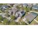 Aerial view of the home and neighborhood, featuring solar panels at 4107 Briar Gate Ln, Winter Garden, FL 34787