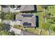 Aerial view of the home with solar panels on the roof and well-maintained landscaping at 4107 Briar Gate Ln, Winter Garden, FL 34787
