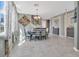 Inviting dining room with elegant lighting and tile floors, ideal for Gathering gatherings at 4107 Briar Gate Ln, Winter Garden, FL 34787
