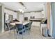 Bright kitchen with a center island, stainless steel appliances, and sleek countertops at 4107 Briar Gate Ln, Winter Garden, FL 34787