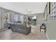 Comfortable living room with tile floors, a ceiling fan, and a large television at 4107 Briar Gate Ln, Winter Garden, FL 34787
