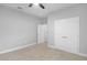 Carpeted bedroom featuring a closet and neutral paint scheme at 4198 Sw 128Th Pl, Ocala, FL 34473
