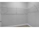 Walk-in closet featuring wire shelving and ample storage space at 4198 Sw 128Th Pl, Ocala, FL 34473