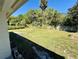 Expansive backyard with lush green grass, mature trees, and privacy at 472 Rosalia Dr, Sanford, FL 32771