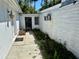 Side view of home with walkway, featuring privacy elements and functional outdoor space at 472 Rosalia Dr, Sanford, FL 32771